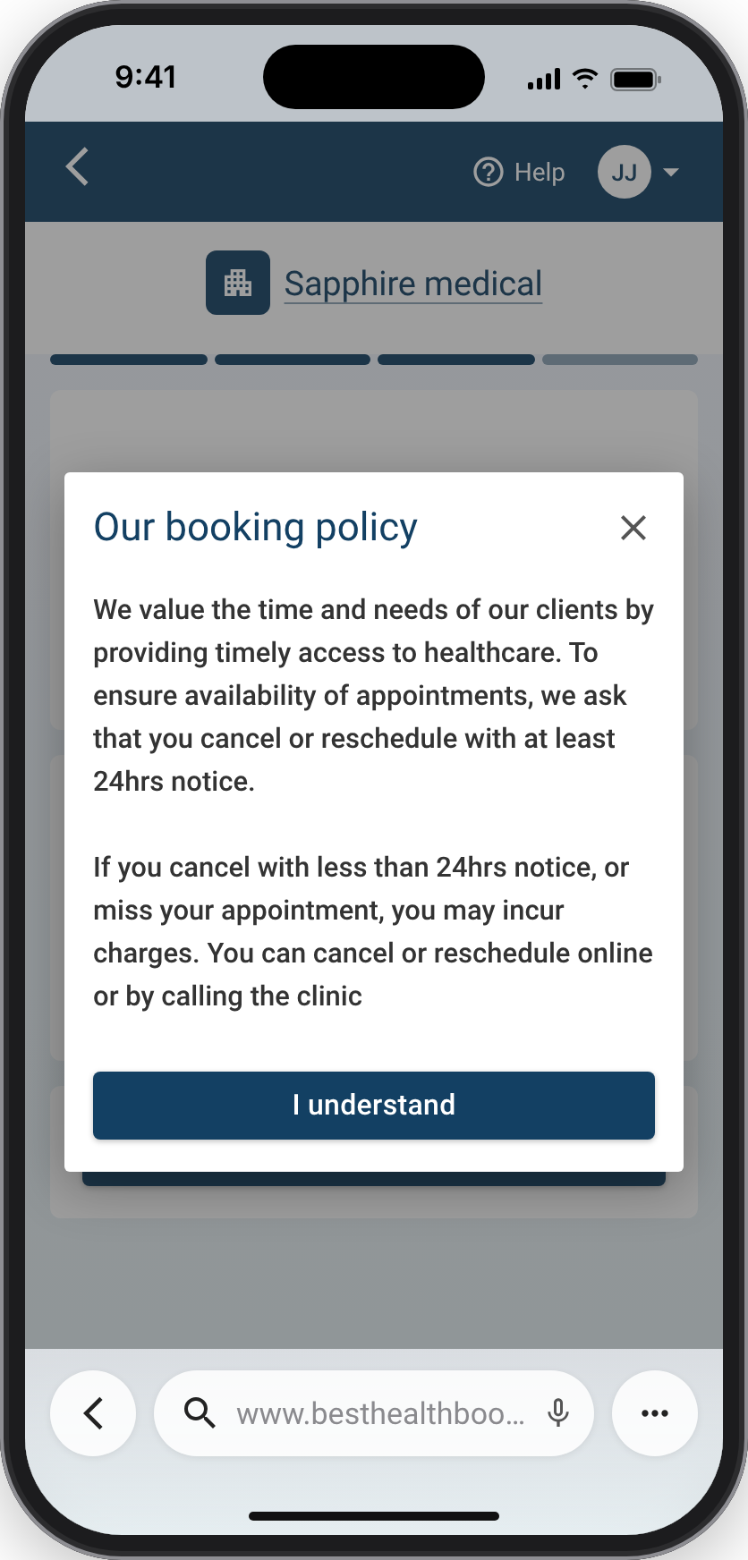 A phone showing the clinic's booking policy in a dialog with an I understand button, during booking